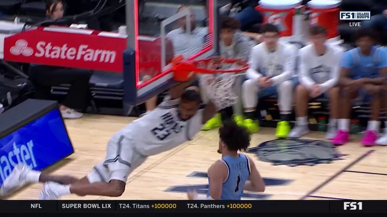 Jordan Burks slams a buzzer-beating dunk to give Georgetown a 35-22 halftime lead over Mount St. Mary’s